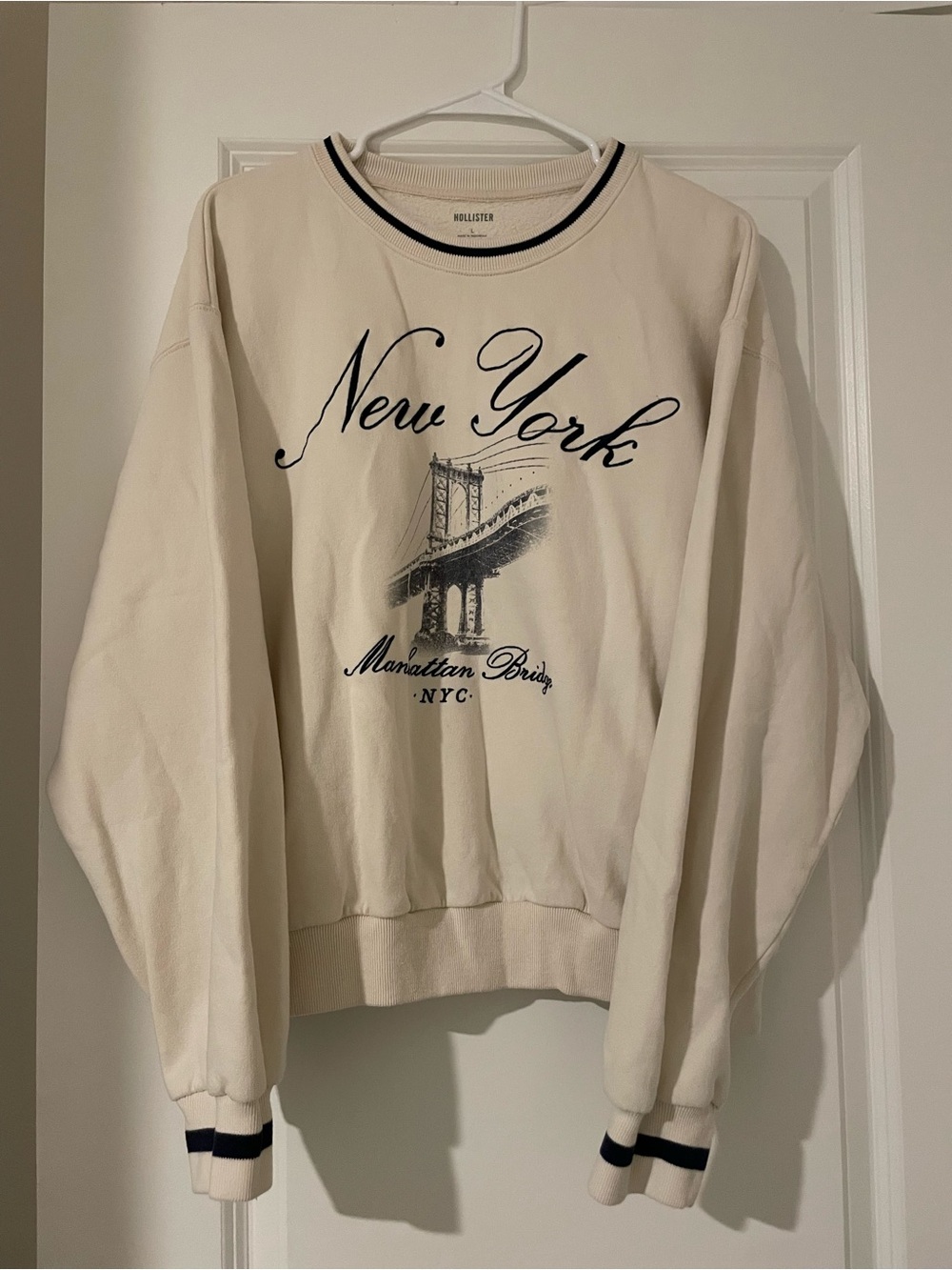 Hollister Cream Pullover Crewneck with Navy New York Graphic